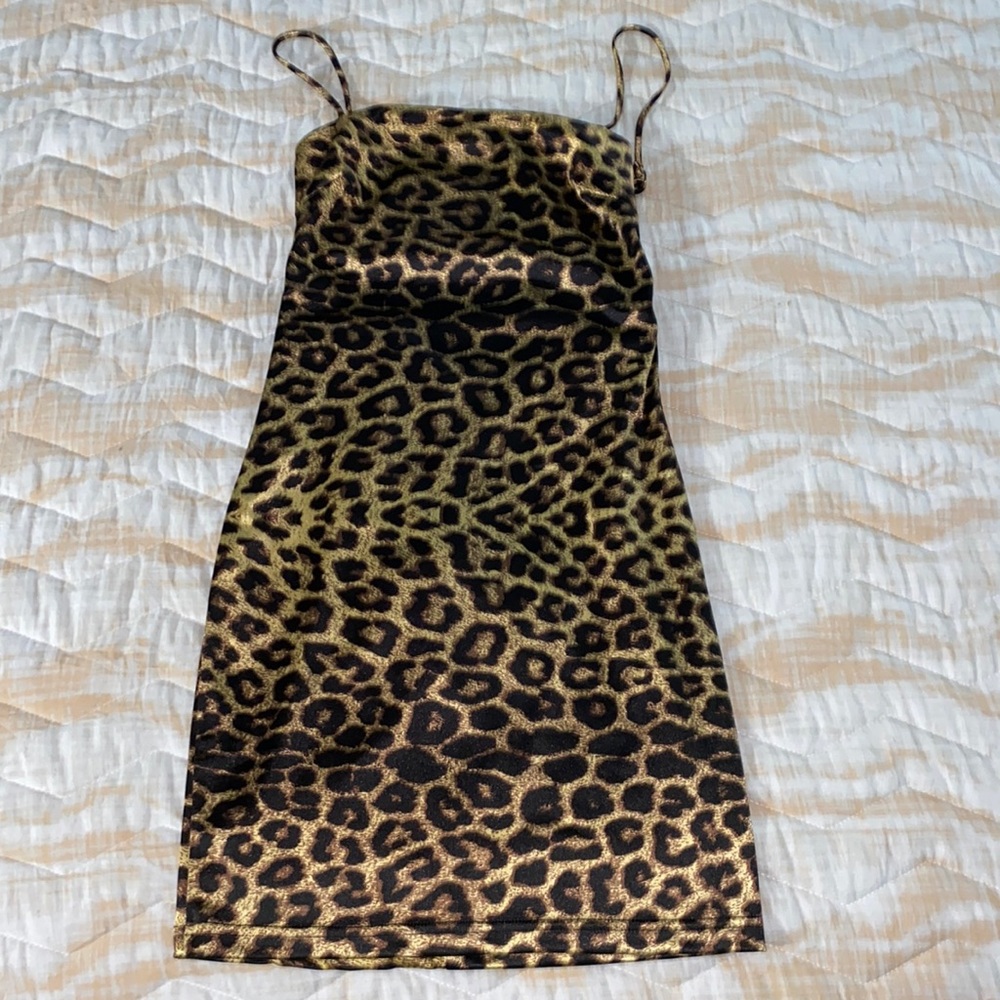 Silky cheetah print slip dress with open back